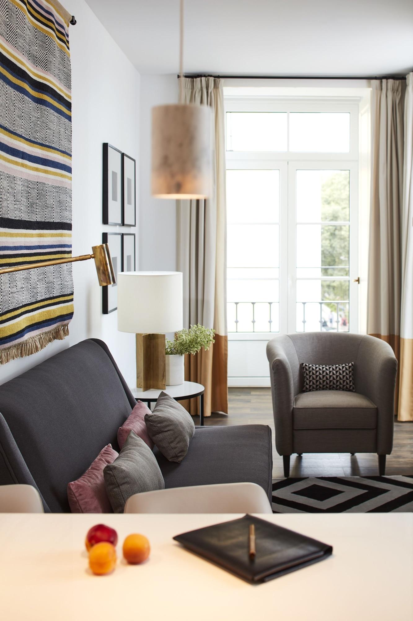 The Lumiares Hotel & Spa - Small Luxury Hotels Of The World Lisbon Exterior photo A living room with a sofa, armchair, and floor lamp